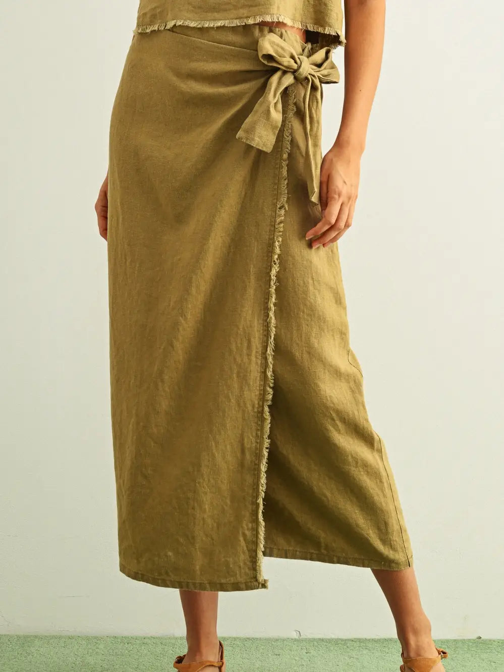 ari raw hem wrap skirt
